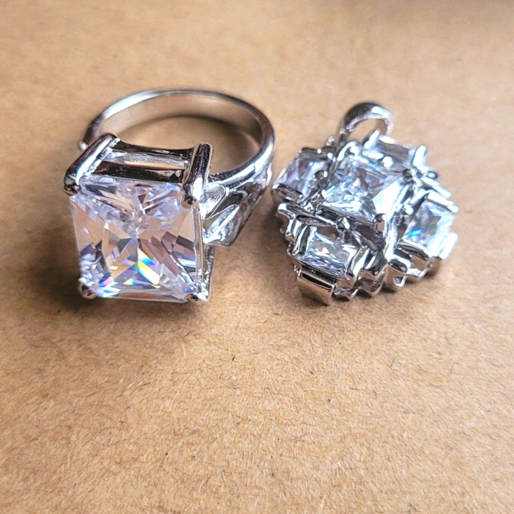 Sterling silver ring with silver pendant